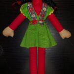 BAMBOLA STOFFA E PLASTICA