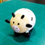 SALVADANAIO IN LEGNO MUCCA