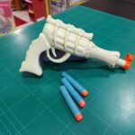 PISTOLA OSSEA CON PROIETTILI NERF