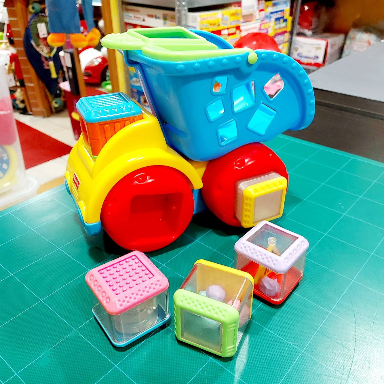 PEEK-A-BLOCKS ROLLIN' RUMBLIN' DUMP TRUCK - Rigiocattolo